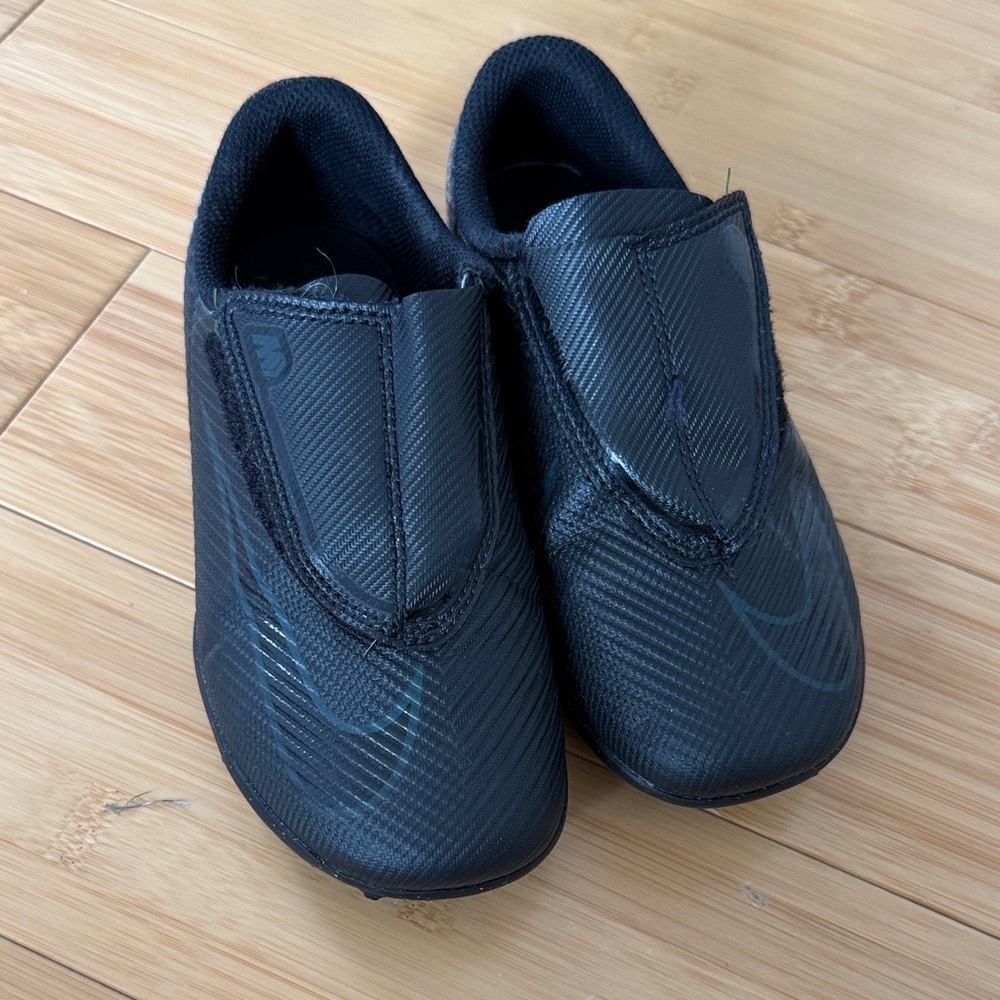 Kids Black Nike cleats